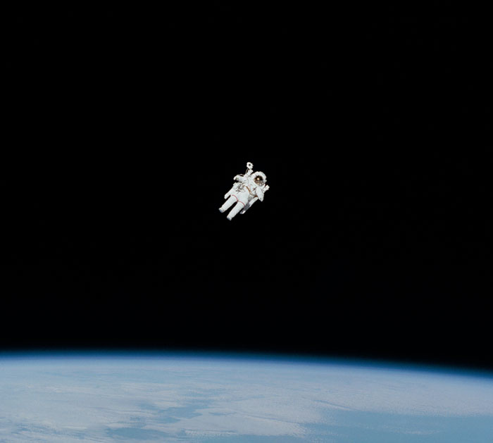 Astronaut floating in the space
