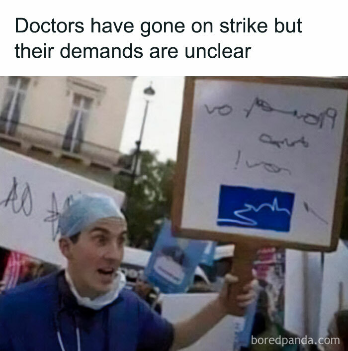 Doctor holding a sign with scribbles during a strike; meme humor for pun enthusiasts.