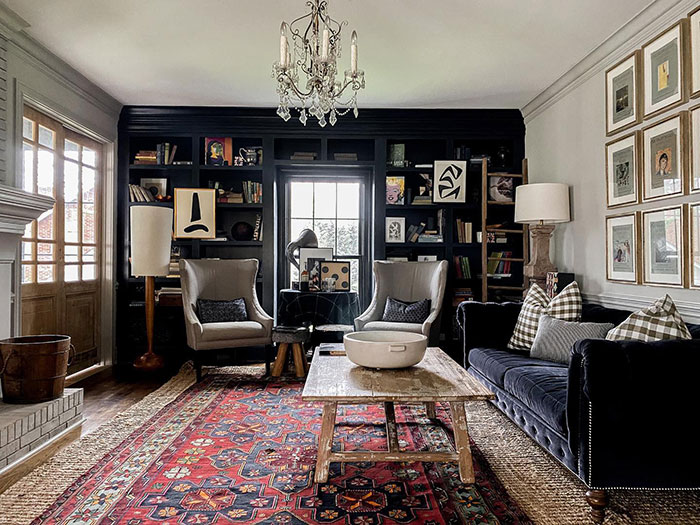 Spacious vintage cozy living room with classic furniture and warm lighting, showcasing home decor ideas and stylish designer insights.