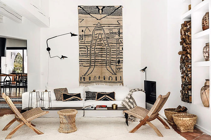 Spacious bright living room with natural materials, woven furniture, and stylish home decor ideas reflecting modern design trends.