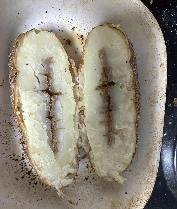 Spent An Hour Perfectly Roasting This Potato For Dinner, Only To Cut It Open And Find This