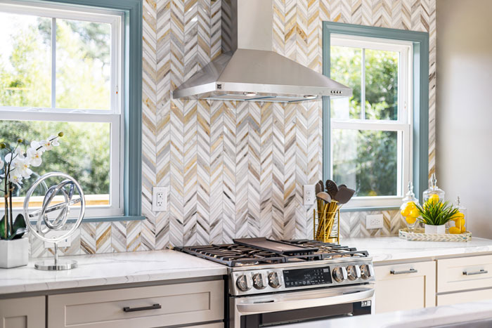 herringbone patterns backsplash in the kitchen
