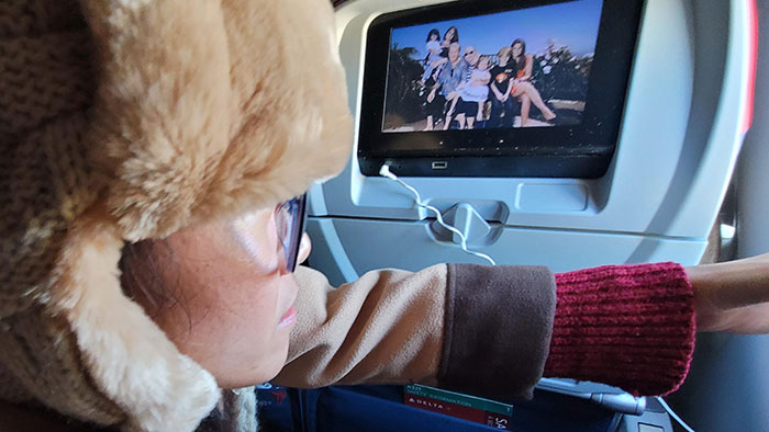 Wants To Record The Whole Flight From The Middle Seat