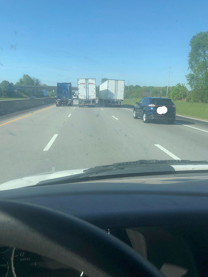 Three Semis Going The Same Speed