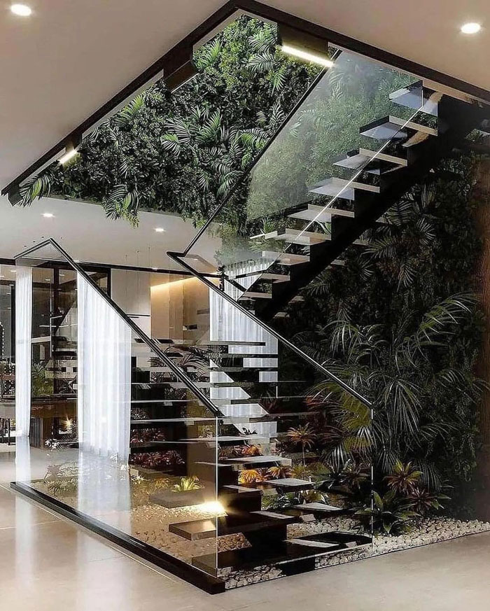 modern U-shaped stairs with glass railings