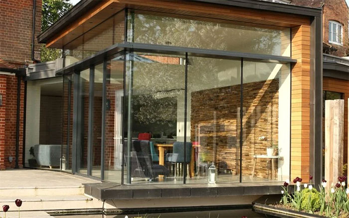 Frameless Floor-To-Ceiling Sunroom Windows Frameless Floor-To-Ceiling Sunroom Windows