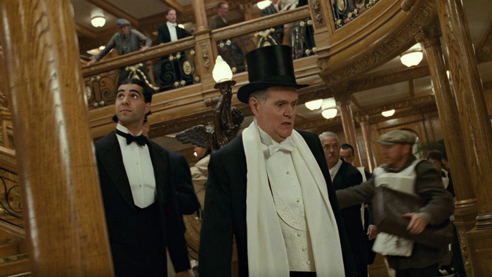 Michael Ensign as Benjamin Guggenheim and Chris Cragnotti as Victor Giglio in 'Titanic' (1997) movie 