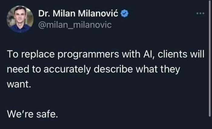 Tweet about AI humorously addressing challenges in replacing programmers.