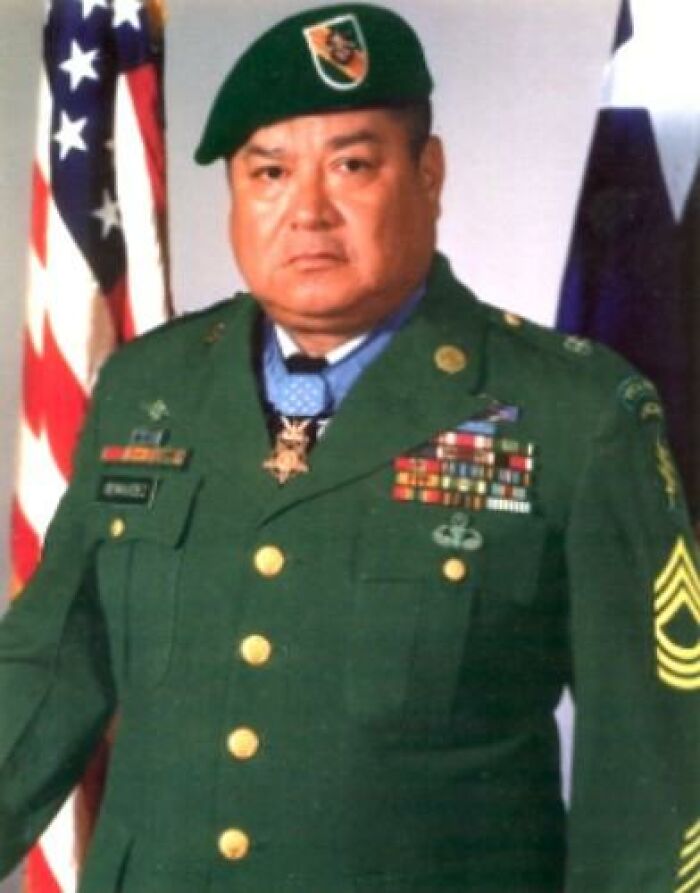 Portrait of a decorated soldier in uniform with medals, representing one of the coolest people to have ever lived.