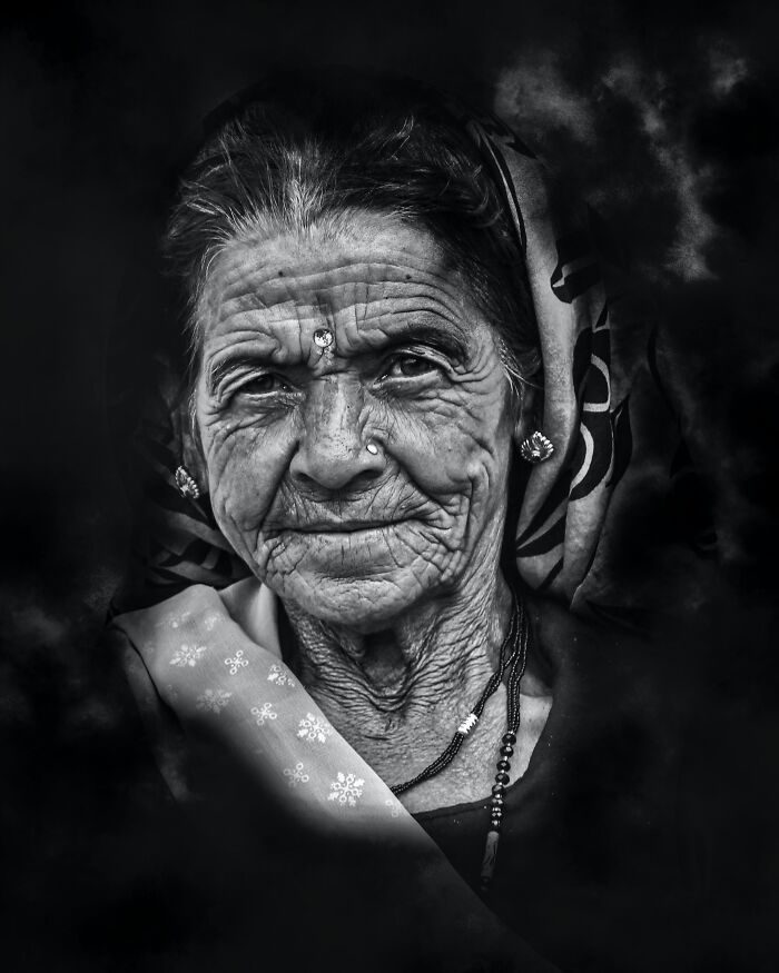 Portrait of an elderly woman with a wise expression, symbolizing the coolest person to have ever lived concept.