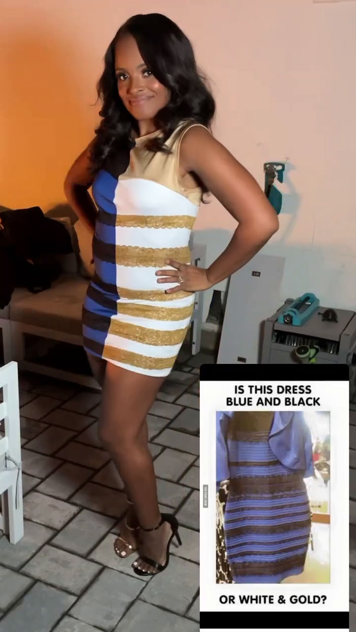 Woman in meme-themed dress, blue and black or white and gold, posing at a party.