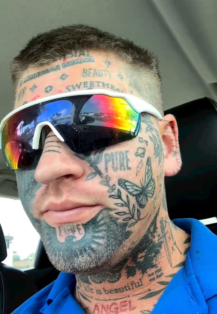 Tiktoker Ethan with sunglasses and face tattoos, including words and designs, related to TikToker's viral anti-bullying response. Tiktoker Ethan with sunglasses and face tattoos, including words and designs, related to TikToker's viral anti-bullying response.