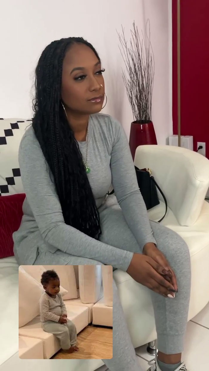 Woman at meme-themed party, sitting on a sofa, wearing gray outfit, with inset of child mimicking pose.