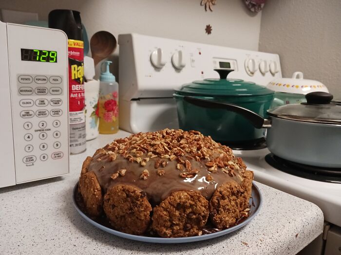 Scratch Chocolate Cake With Caramel Filling, Chocolate Frosting With Carmel On Top, Pecans And Homemade Cowboy Cookies On The Side