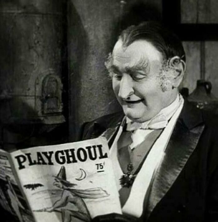 Man reading a magazine titled "Playghoul," showcasing humor about getting old faster than expected.