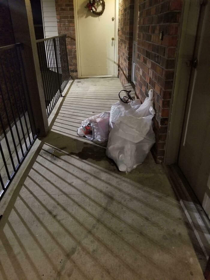 My Neighbors Leave Their Trash Outside Their Door. I Have To Walk Through Leaking, Smelly Bags Of Garbage To Get To Mine. No, We Do Not Have A Trash Pick Up Service, And The Dumpster Is Not That Far Away