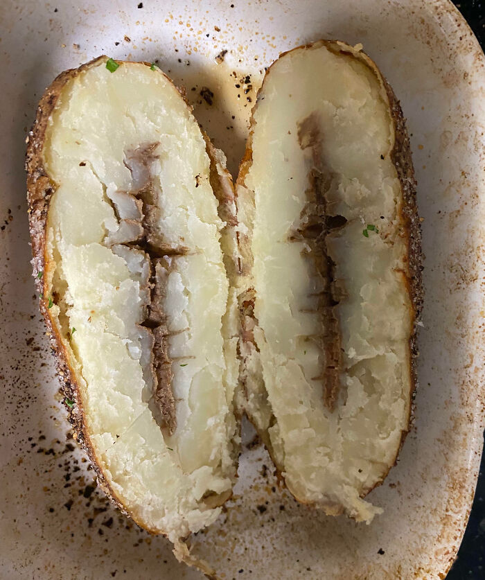 Spent An Hour Perfectly-Roasting This Potato For Dinner, Only To Cut It Open And Find This
