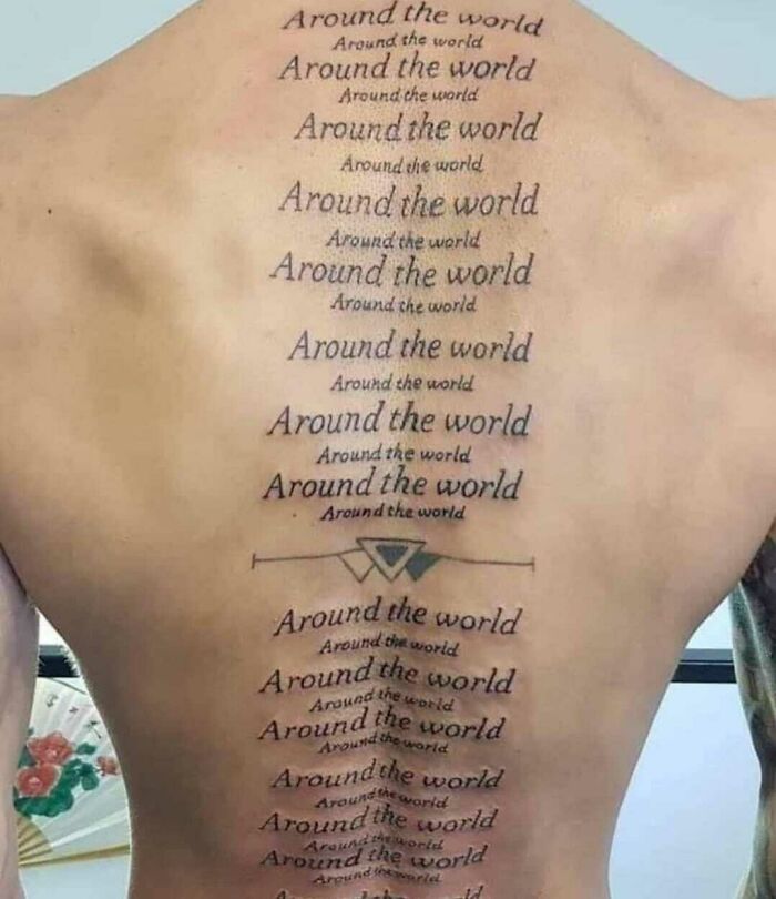 Back tattoo with repeated "Around the world" text in various sizes. Worst tattoos collection.