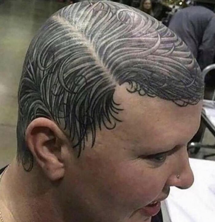 Head tattoo resembling hair, illustrating one of the worst tattoos.