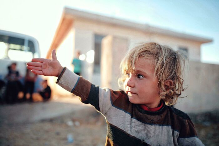 A Little Girl In Northern Iraq Helping To Block A Flare From Hitting My Lens 