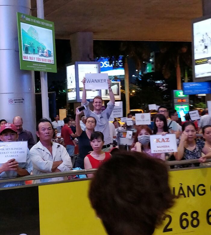 British Guy Here, Flew To Vietnam To Meet My Aussie Mate. Told Him I Wanted Him To Have A Sign For Me While Waiting For Me To Cross Through Customs. Guess Which One He Is