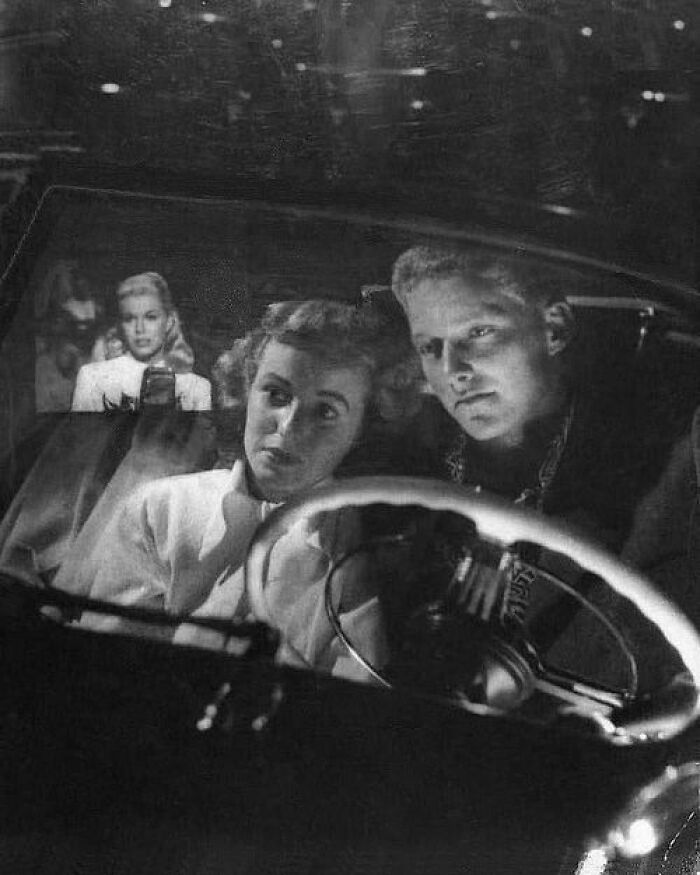 Couple Snuggling At A Drive-In Movie Theater. California, 1949