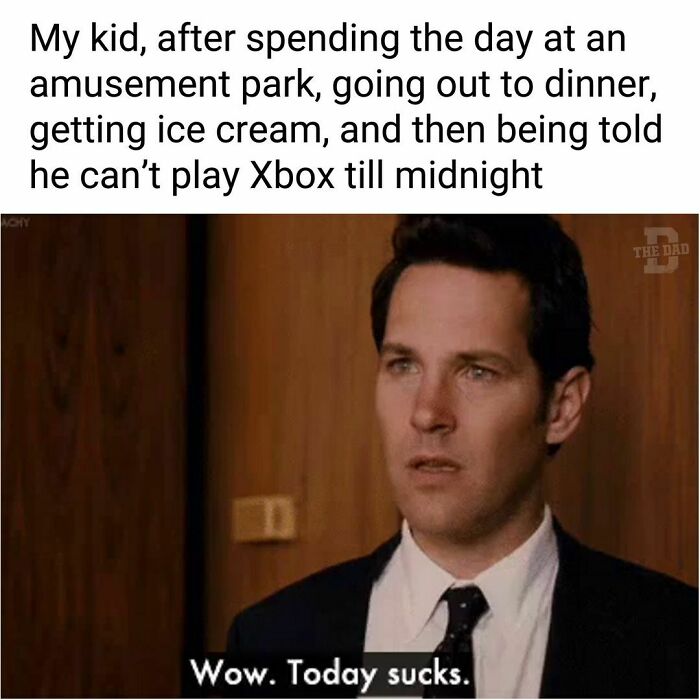 Man with a disappointed expression below humorous dad joke about kids and parenting.