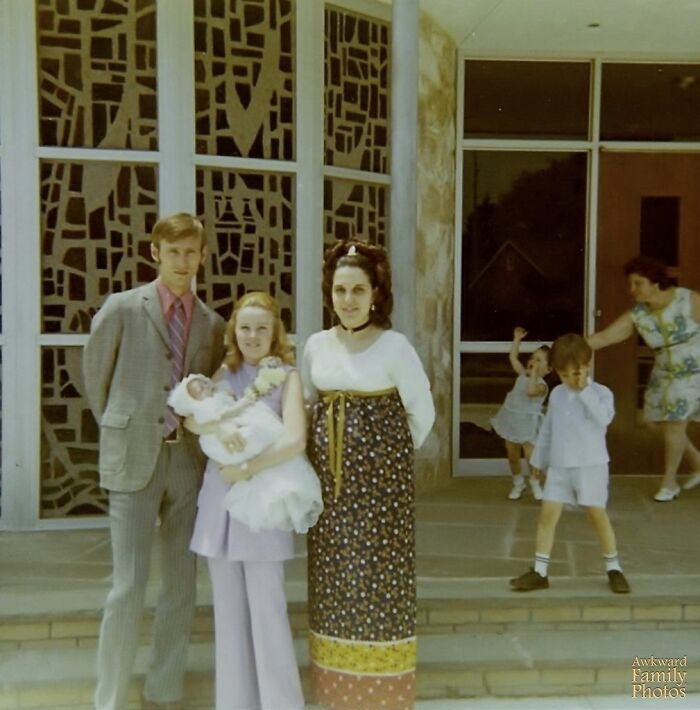 This Was My Christening, June 1971. I’m The Baby Obviously, My Godmother Is Holding Me, My Parents Are Next To Her. Their Hideous Outfits Aren’t The “Awkward” Part Of This Photo. In The Background, My Grandmother Is Pulling My Sister’s Hair While My Brother Is Recovering From A Smack! All Of This Right On The Front Steps Of A Church
