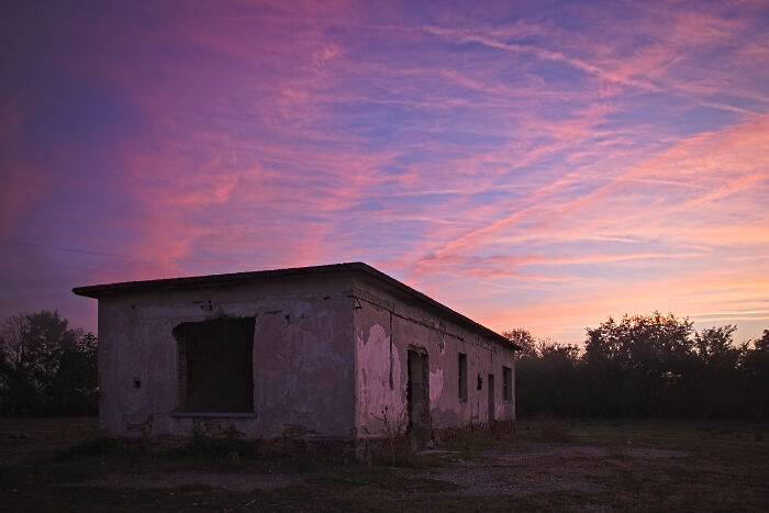 An Abandoned Building Nearby The Lake