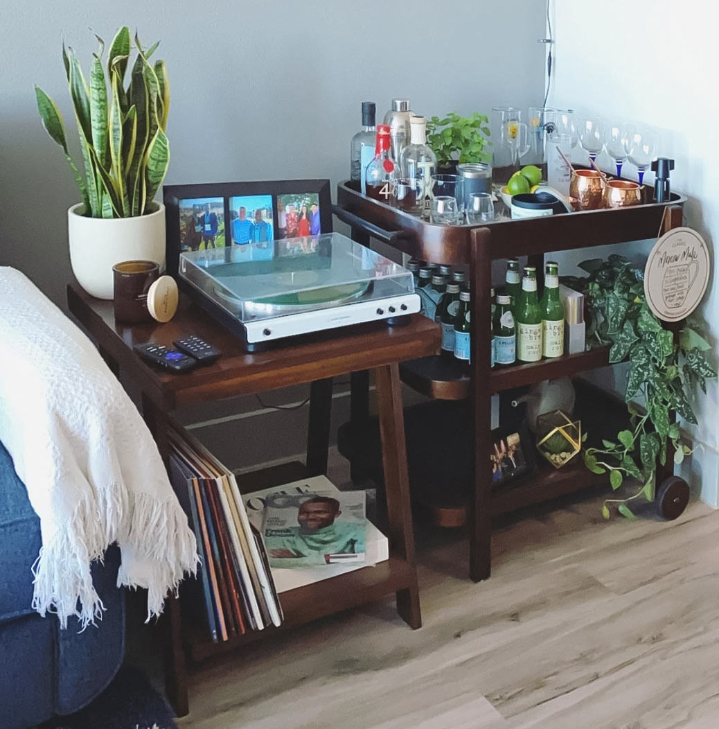 Home bar with drinks and plants