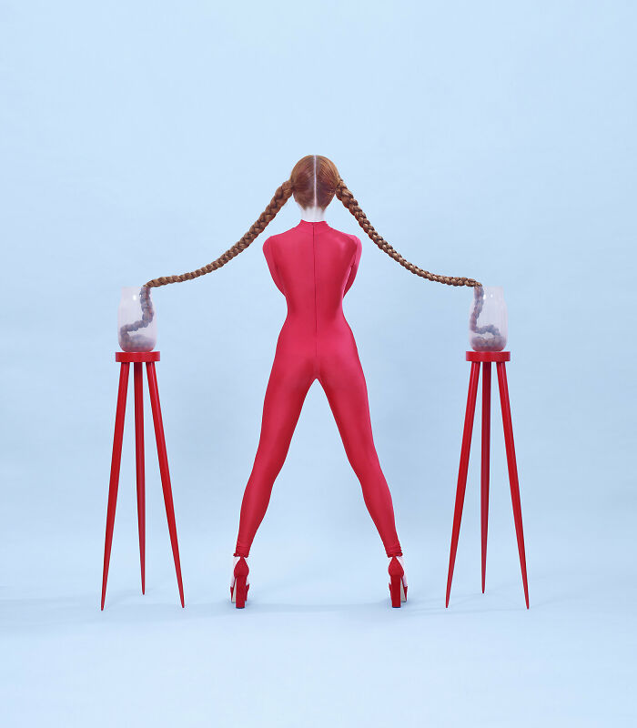 An image of a woman with her pigtails in jars