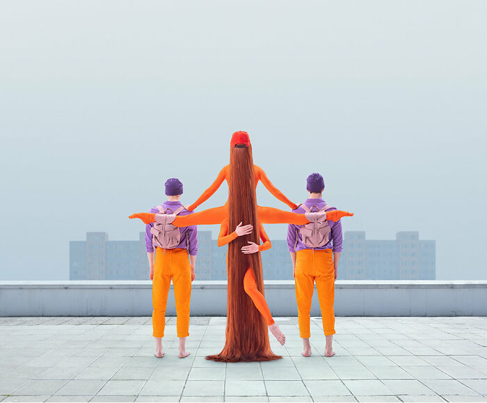 An image of a surreal sculpture out of people