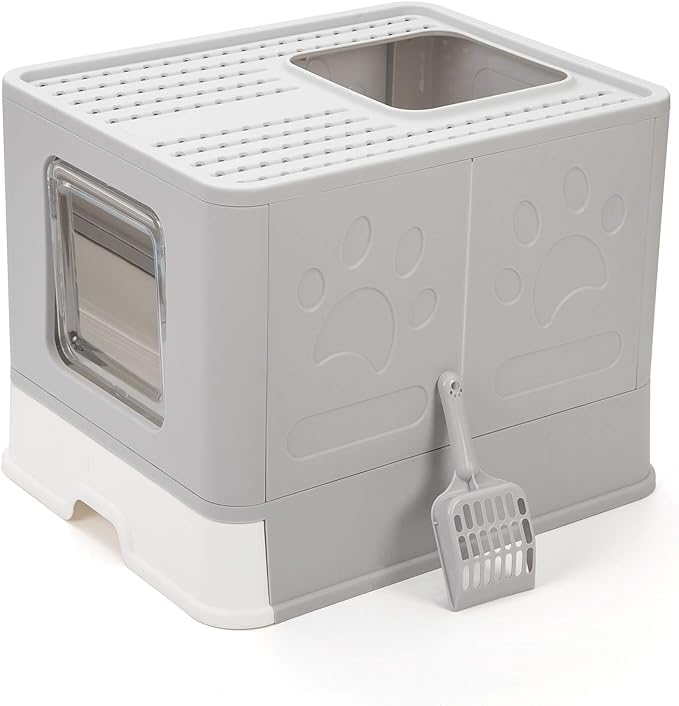 Gray litter box with a paw print design and scoop, designed to keep dogs out.