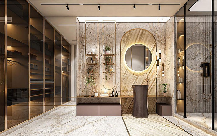 Luxurious bathroom featuring elegant white and gold marble tile design ideas on walls and flooring.