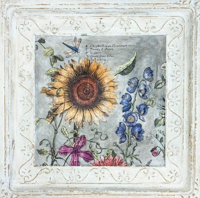 White chalk-painted picture frame with flowers painted in it White chalk-painted picture frame with flowers painted in it