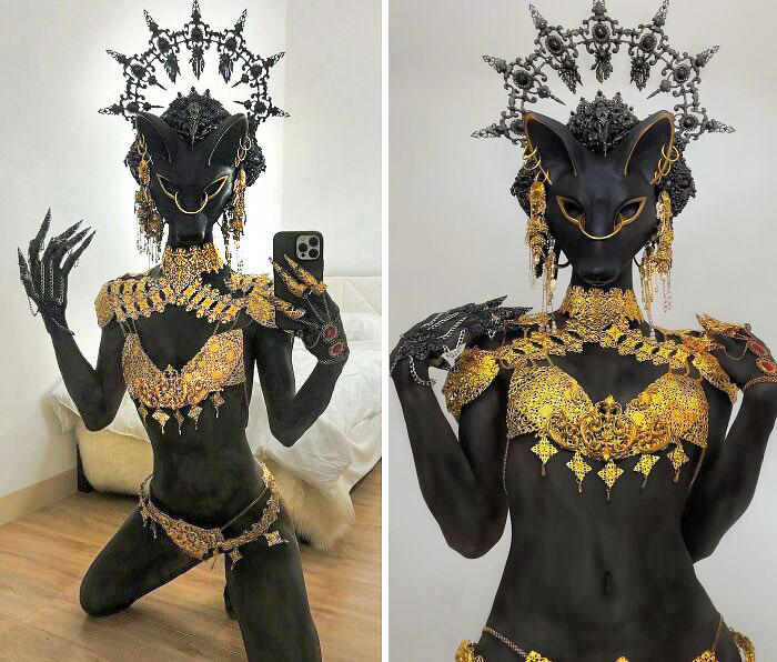 Black cat Halloween costume with intricate gold accessories and an elaborate headpiece, showcasing a clever and artistic design.