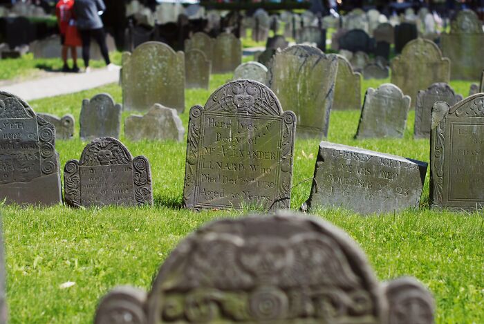 Graveyard with green grass and gravestones