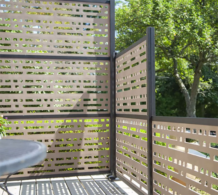 Multi-colored screen panel deck railing designs creating privacy and adding a modern touch to outdoor spaces.
