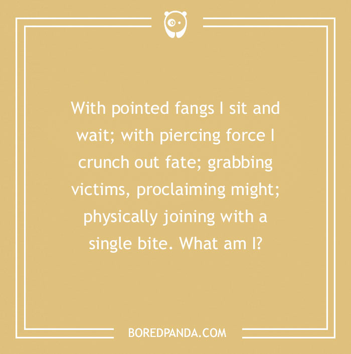 Riddle text on a tan background asking, "With pointed fangs I sit and wait... What am I?"