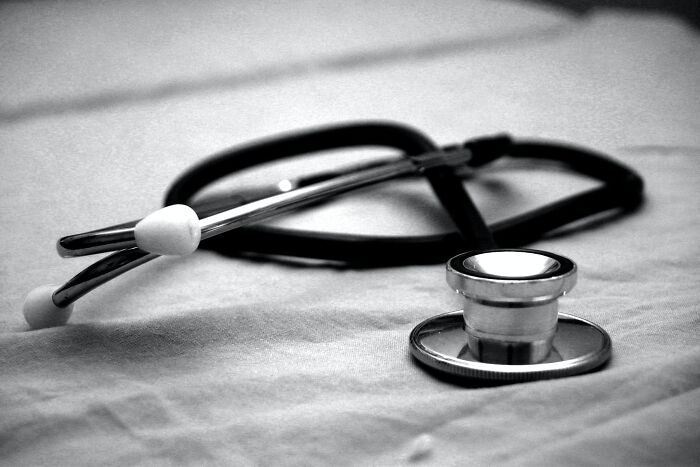 A stethoscope resting on a cloth surface, symbolizing curious shower thoughts and questions on healthcare and medicine.