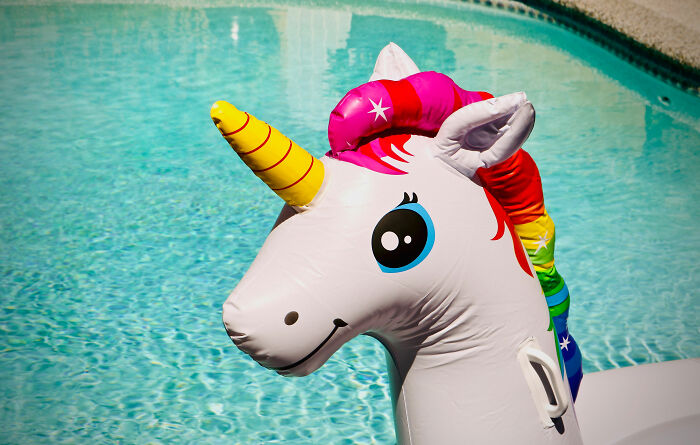 Unicorn balloon near water