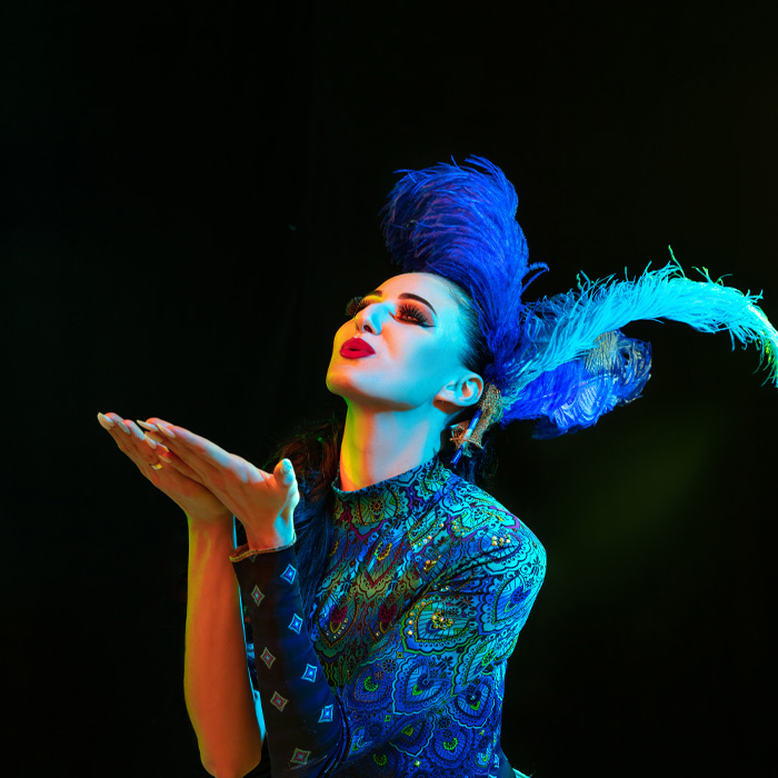 Woman wearing a costume sending kisses 