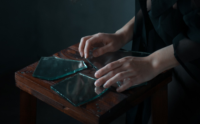 Person holding glass