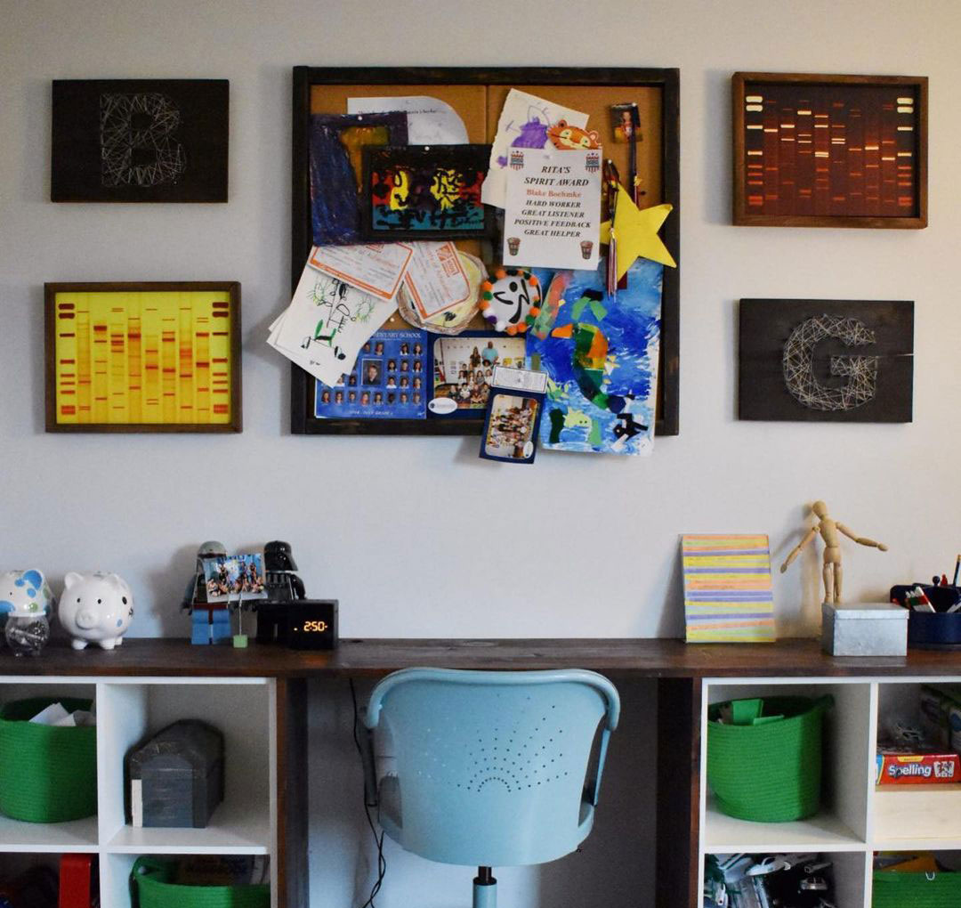 wooden kids desk with corkboard