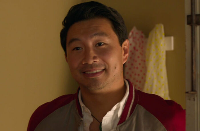 Shang-Chi wearing red shirt