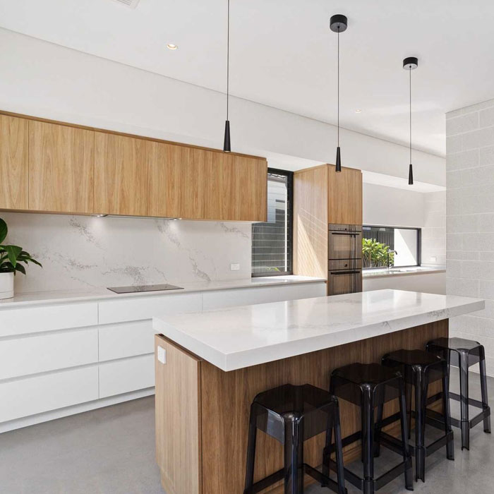 Minimalist brown and white kitchen featuring modern kitchen designs with clean lines and timeless style.