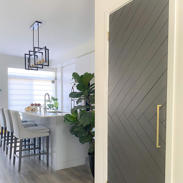 Grey pantry door in the kitchen 