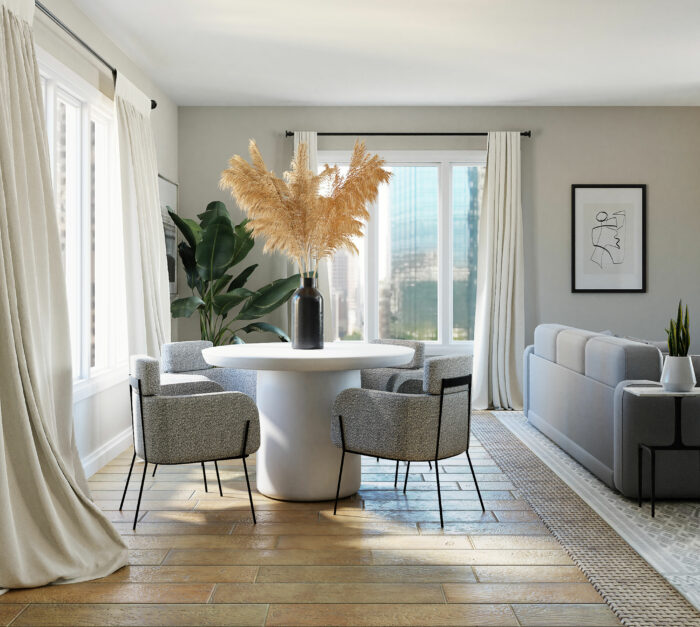 Modern living room with Sherwin-Williams paint colors featuring a large vase on a round table and neutral gray tones.