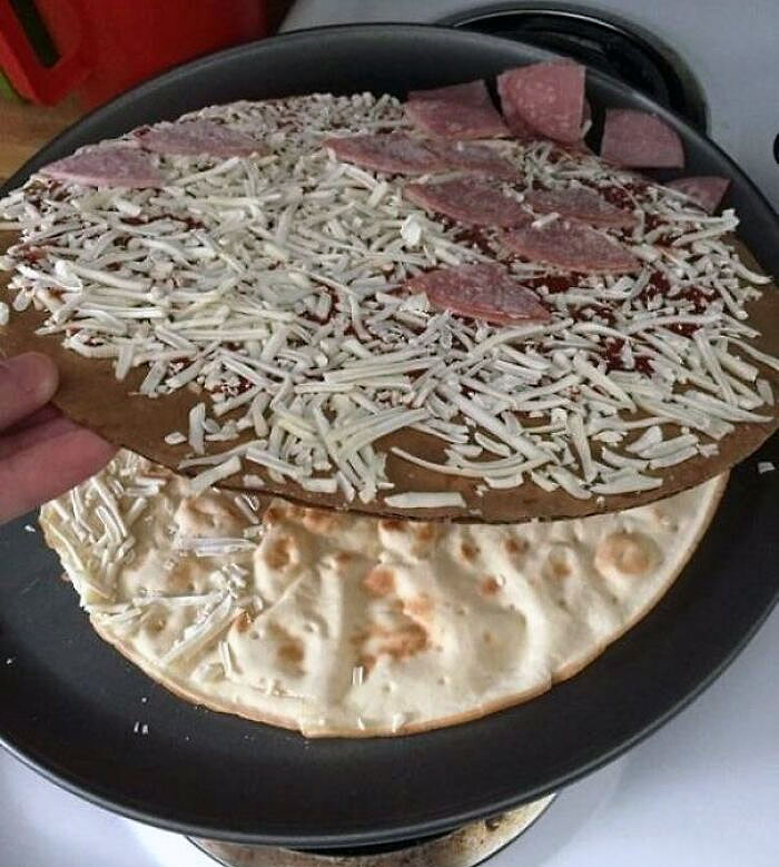 My Frozen Pizza Had The Cardboard In Between The Toppings And The Crust
