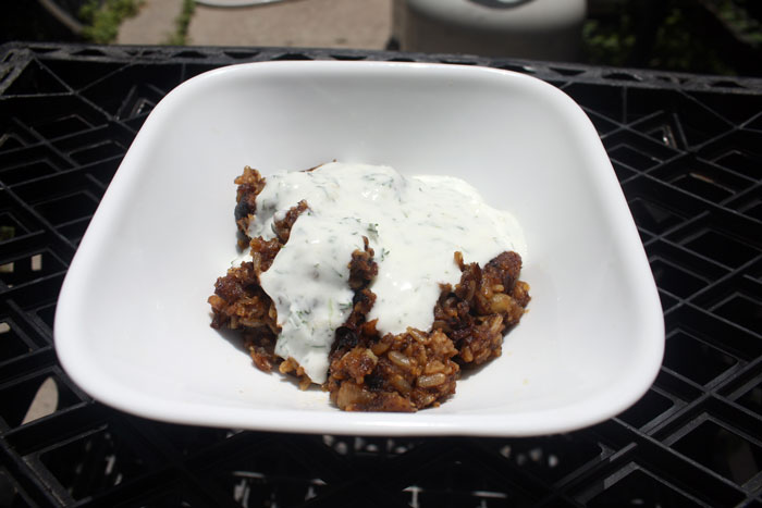 Cooking fail of burnt rice with sauce served in a white bowl, shared by an online community forum user.